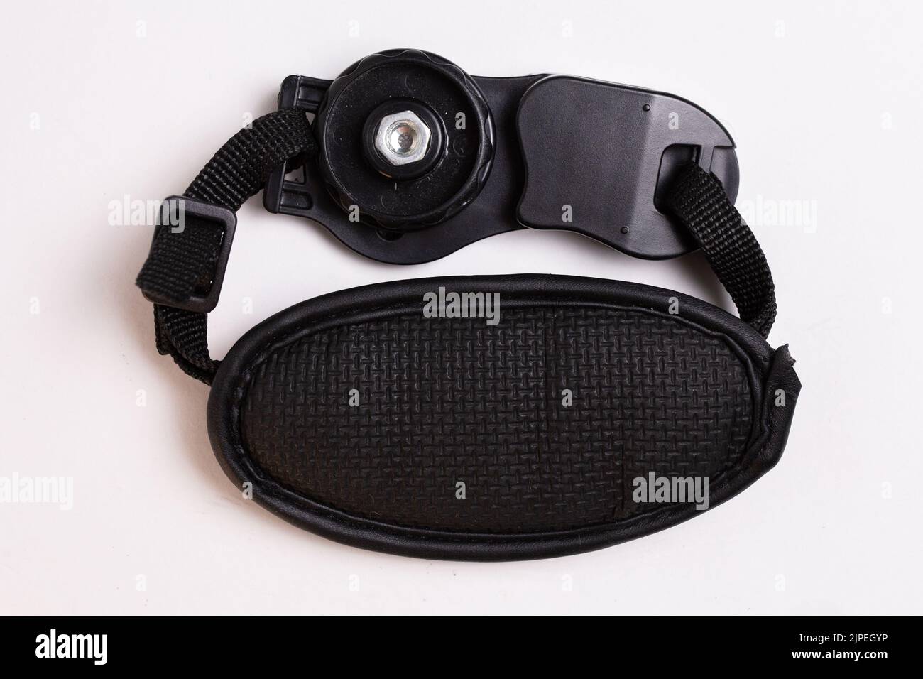 black leather camera strap on white background. Stock Photo