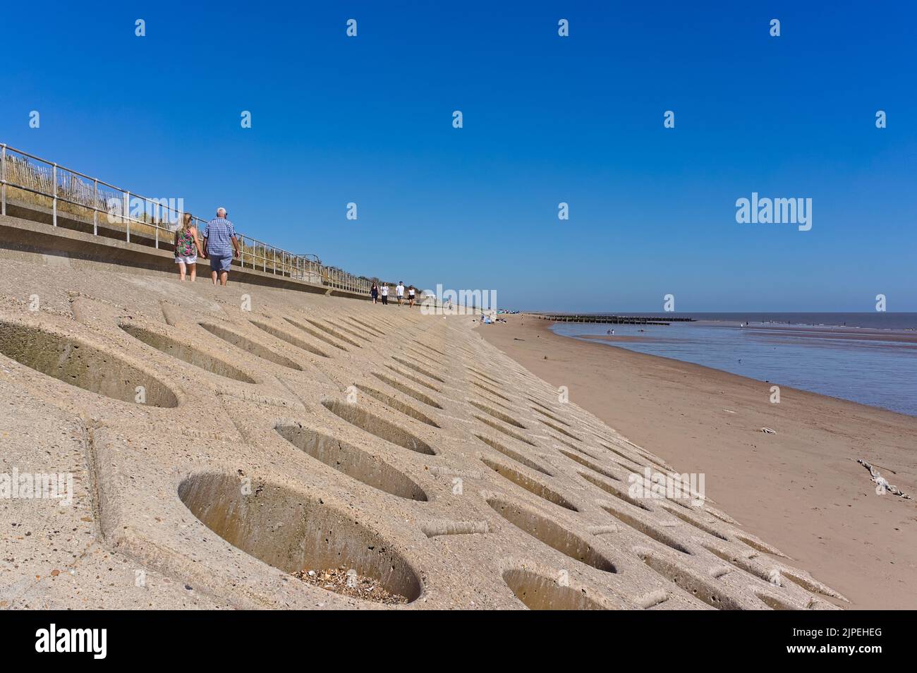 Modern sea defenses along the beach on the Skegness coast Stock Photo