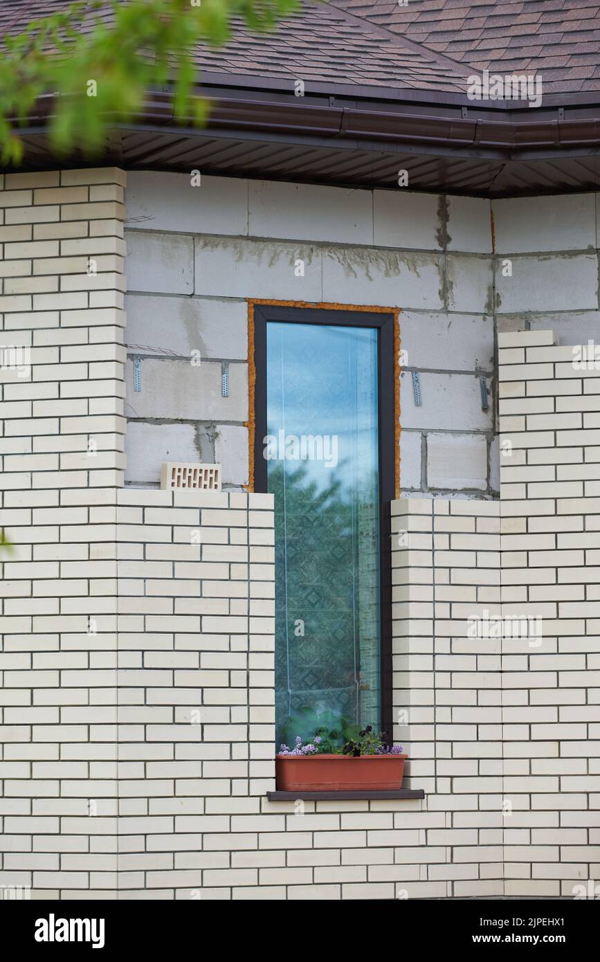 Brickwork of exterior wall cladding with facade bricks Stock Photo Alamy