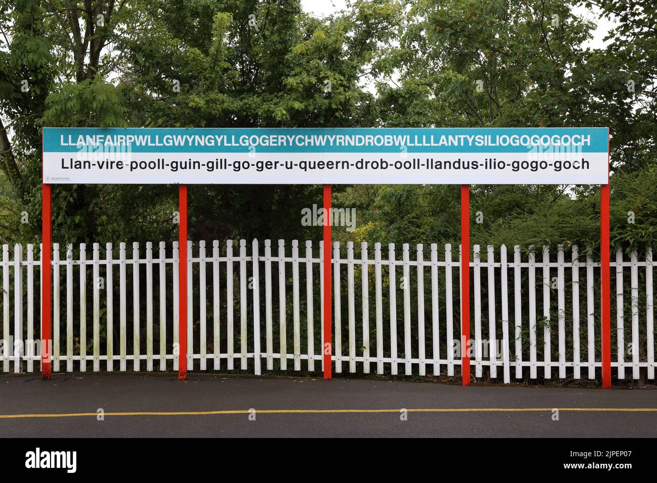 World's longest place name, Wales, UK. LLANFAIRPWLLGWYNGLLGOGERYCHWYRNDROBWLLLLANTYSILIOGOGOGOCH. Railway station sign. Stock Photo