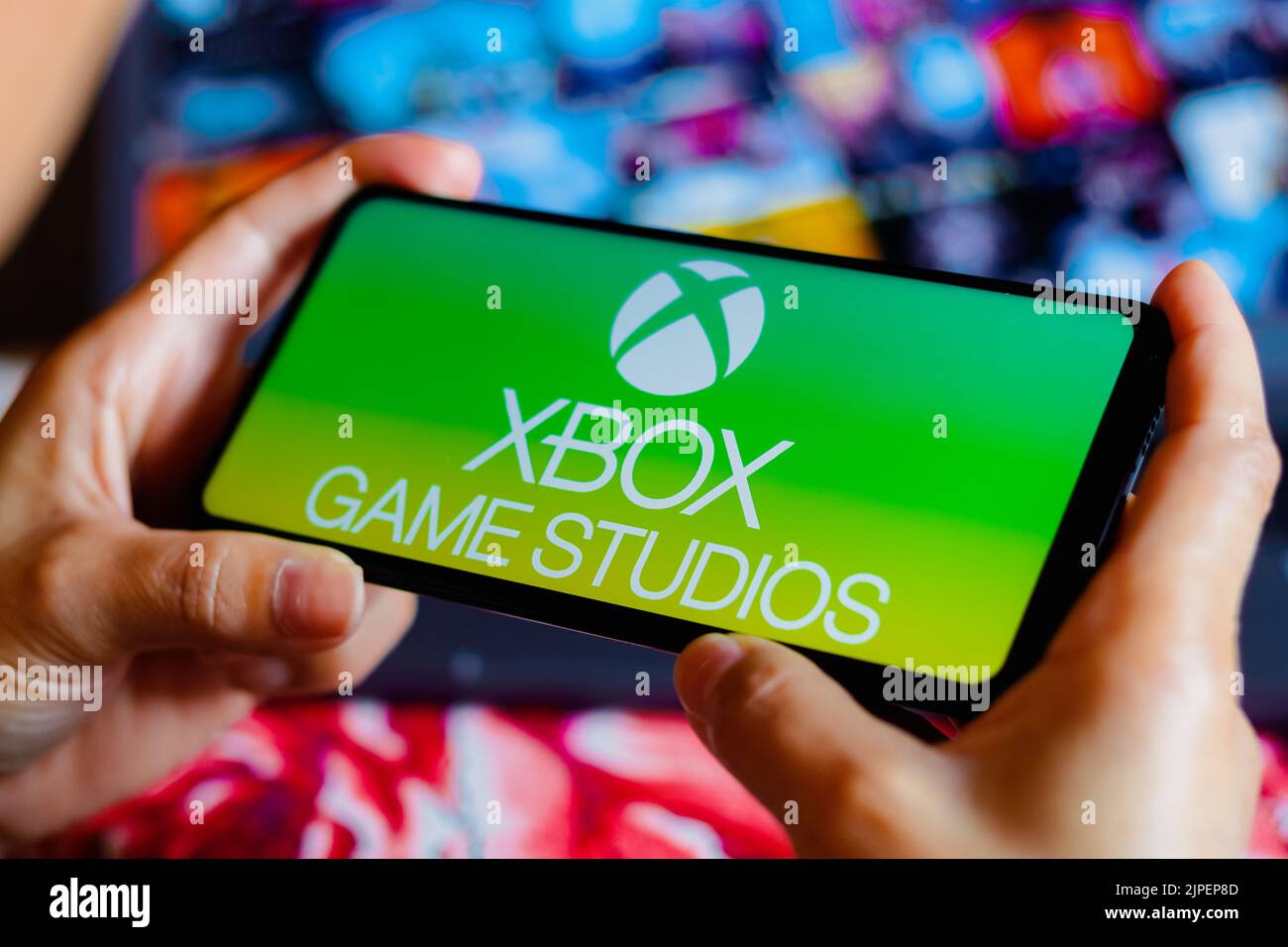 In this photo illustration, the Xbox Game Studios logo is displayed on a smartphone screen. Stock Photo