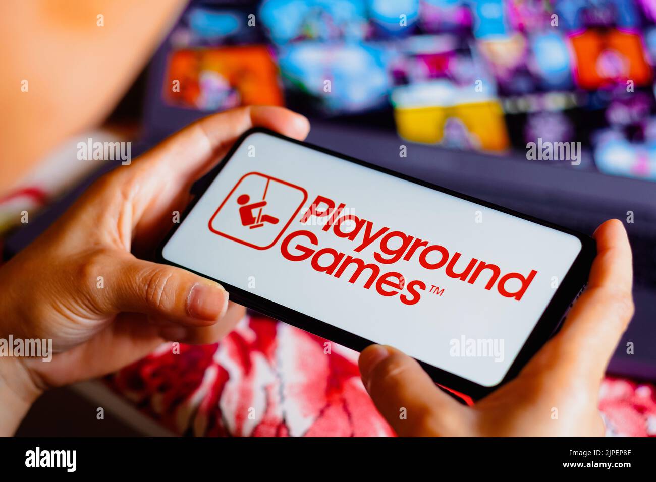 In this photo illustration, the Playground Games logo is displayed on a smartphone screen. Stock Photo