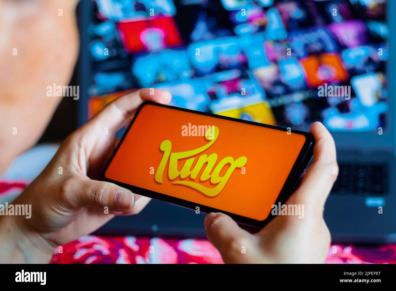 In this photo illustration, the King Digital Entertainment logo is displayed on a smartphone screen. Stock Photo