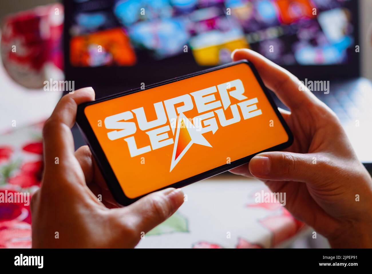 In this photo illustration, the Super League Gaming logo is displayed on a smartphone screen. Stock Photo