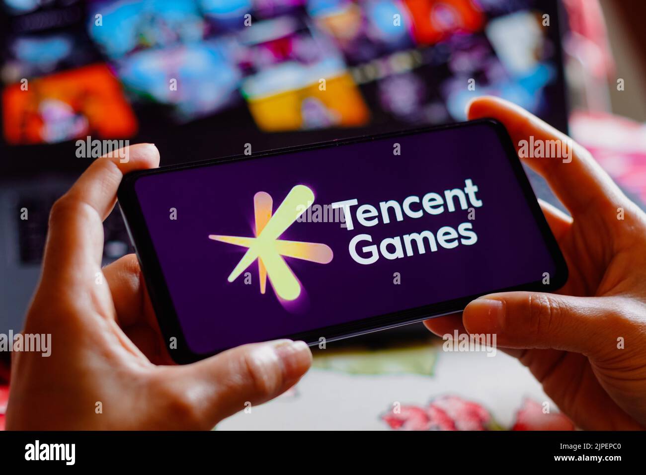 In this photo illustration, the Tencent Games logo is displayed on a smartphone screen. Stock Photo