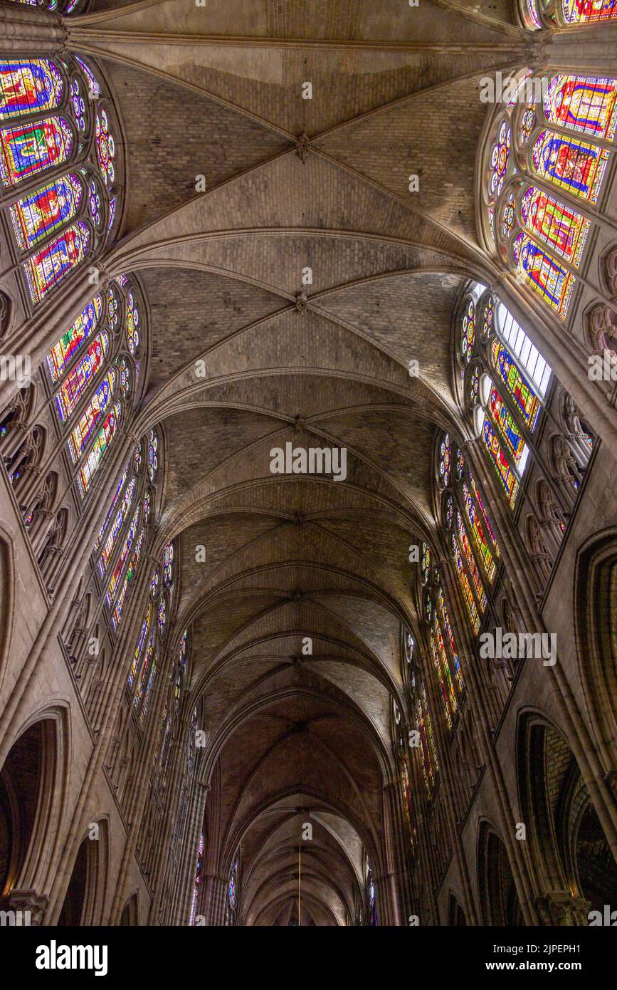 vaulted nave and stained glass of 13th century Saint-Denis basilica, Paris, France Stock Photo