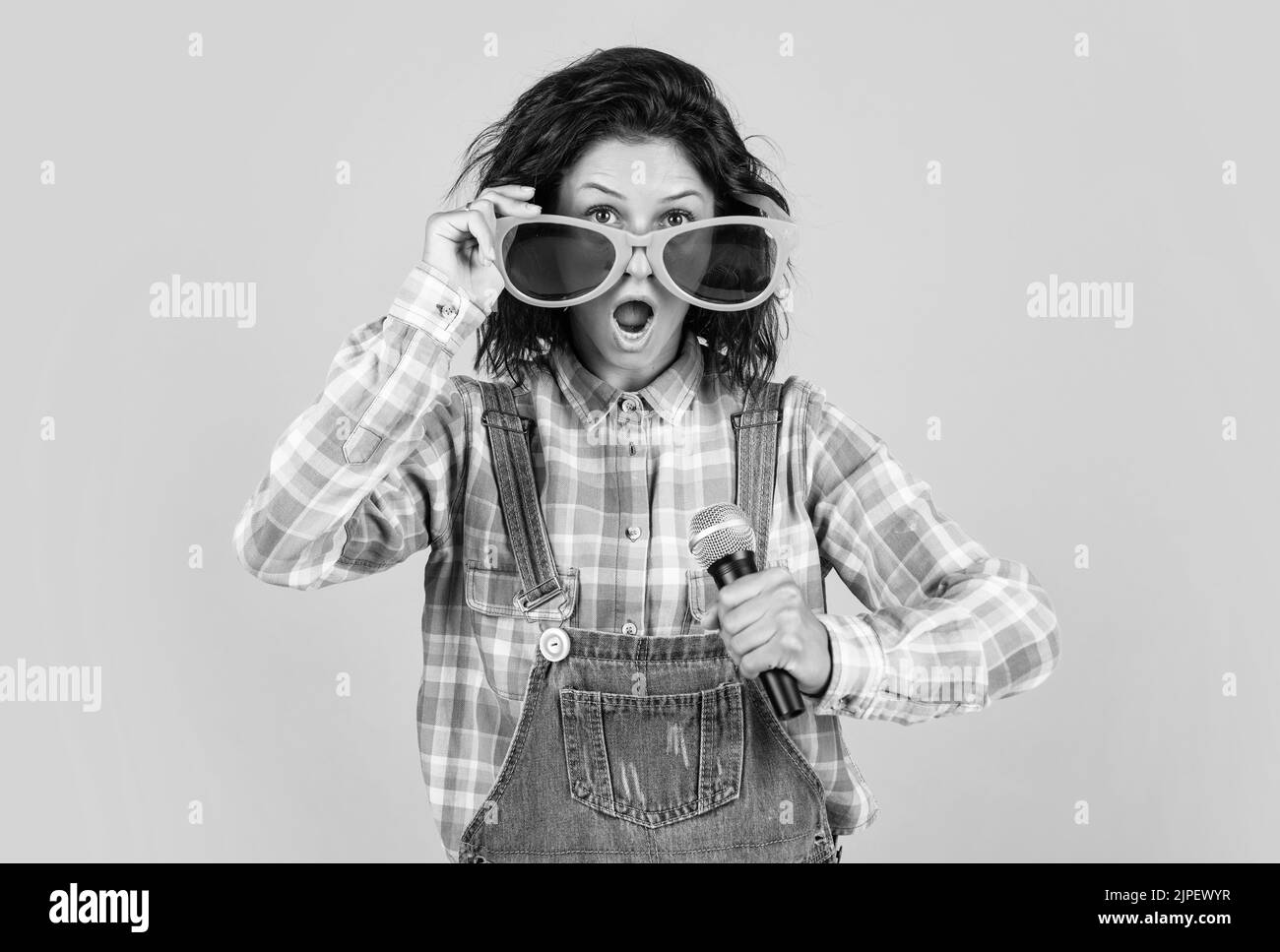 Singing girl with mic Black and White Stock Photos & Images - Alamy