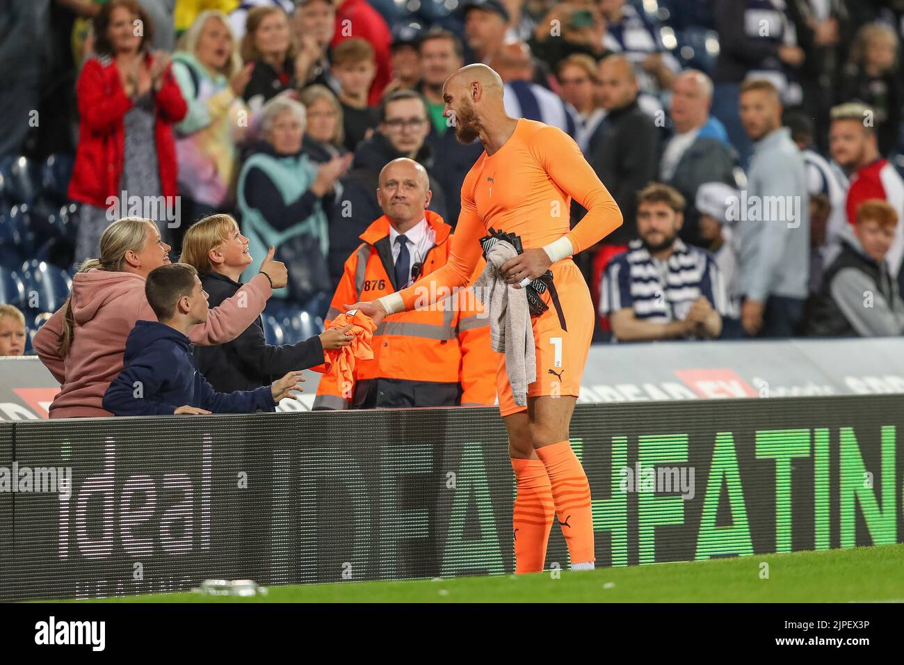 West Bromwich, UK. 17th Aug, 2022. Dave Button #1 of West Bromwich Albion gives his shirt to. Young fan in West Bromwich, United Kingdom on 8/17/2022. (Photo by Gareth Evans/News Images/Sipa USA) Credit: Sipa USA/Alamy Live News Stock Photo