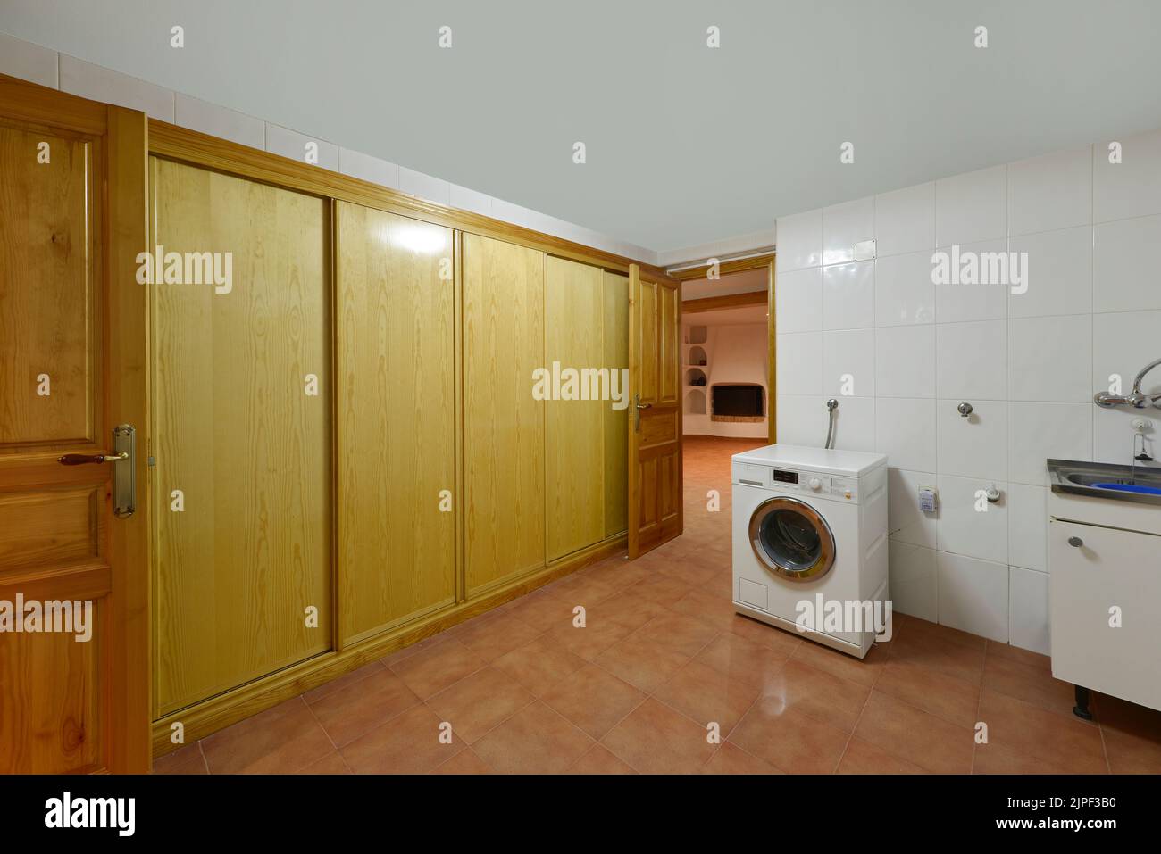 Ironing room with for clothes, washers and dryers Stock Photo