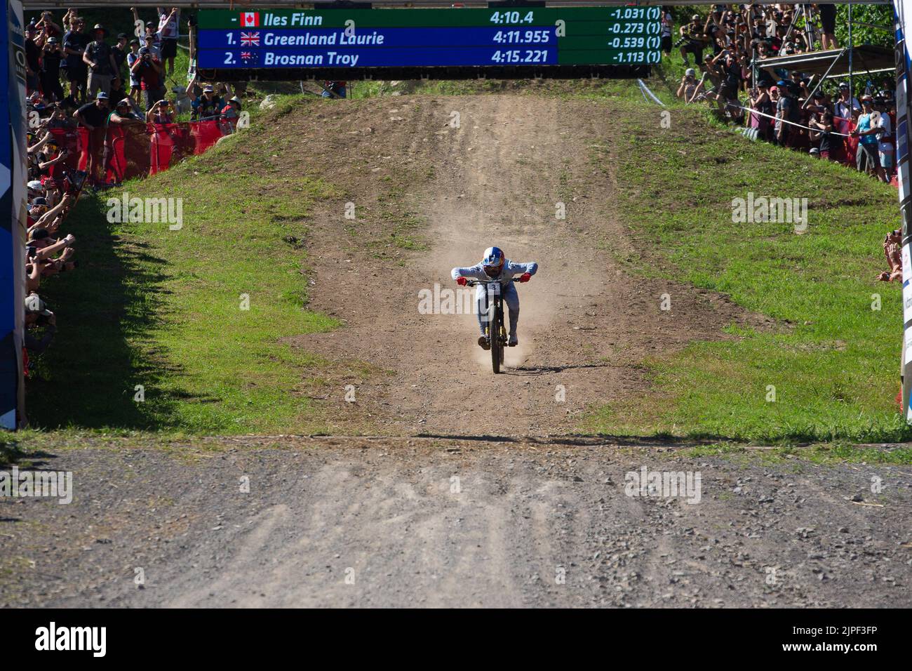 August 06, 2022: Finn Iles of Canada (3) races to the finish line winning the MenÕs Downhill Final during the 2022 Mercedes-Benz UCI Mountain Bike World Cup held at Mont-Sainte-Anne in Beaupre, Quebec, Canada. Daniel Lea/CSM Stock Photo