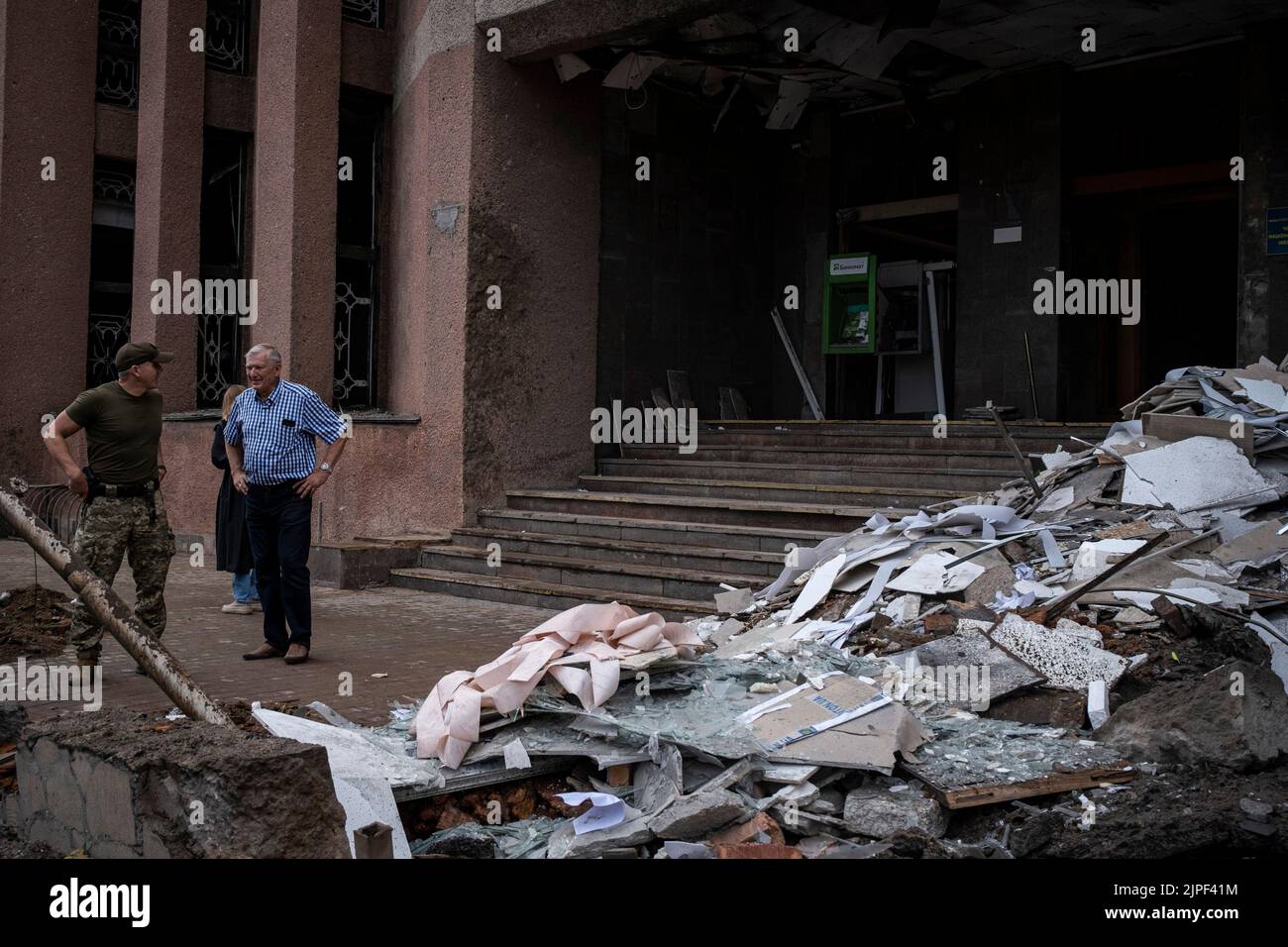 Mykolaiv Mayor Oleksandr Sienkevych and University Principal Leonid Klymenko inspect the damage by Russian artillery strikes at Petro Mohyla Black Sea National University in Mykolaiv. The university was struck by several Russian shelling at around 1:30 on August 16, as the mayor Oleksandr Sienkevych claimed no one was injured in the shelling. Russia's Ministry of Defense said earlier on social media that the university was a military strategic target with storage of heavy weapons. Stock Photo