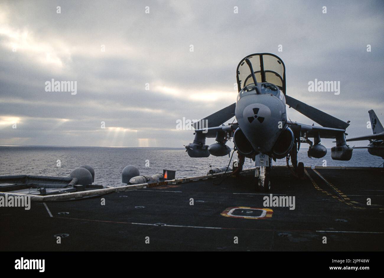 Grumman EA-6B Prowler tied down on the flight deck of a United States Navy aircraft carrier Stock Photo