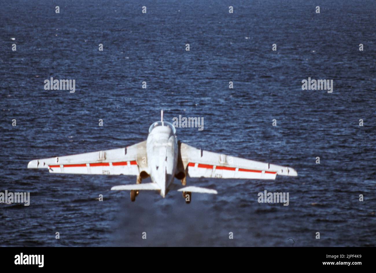 Grumman A-6 Intruder takes off from a United States Navy aircraft carrier underway at sea Stock Photo