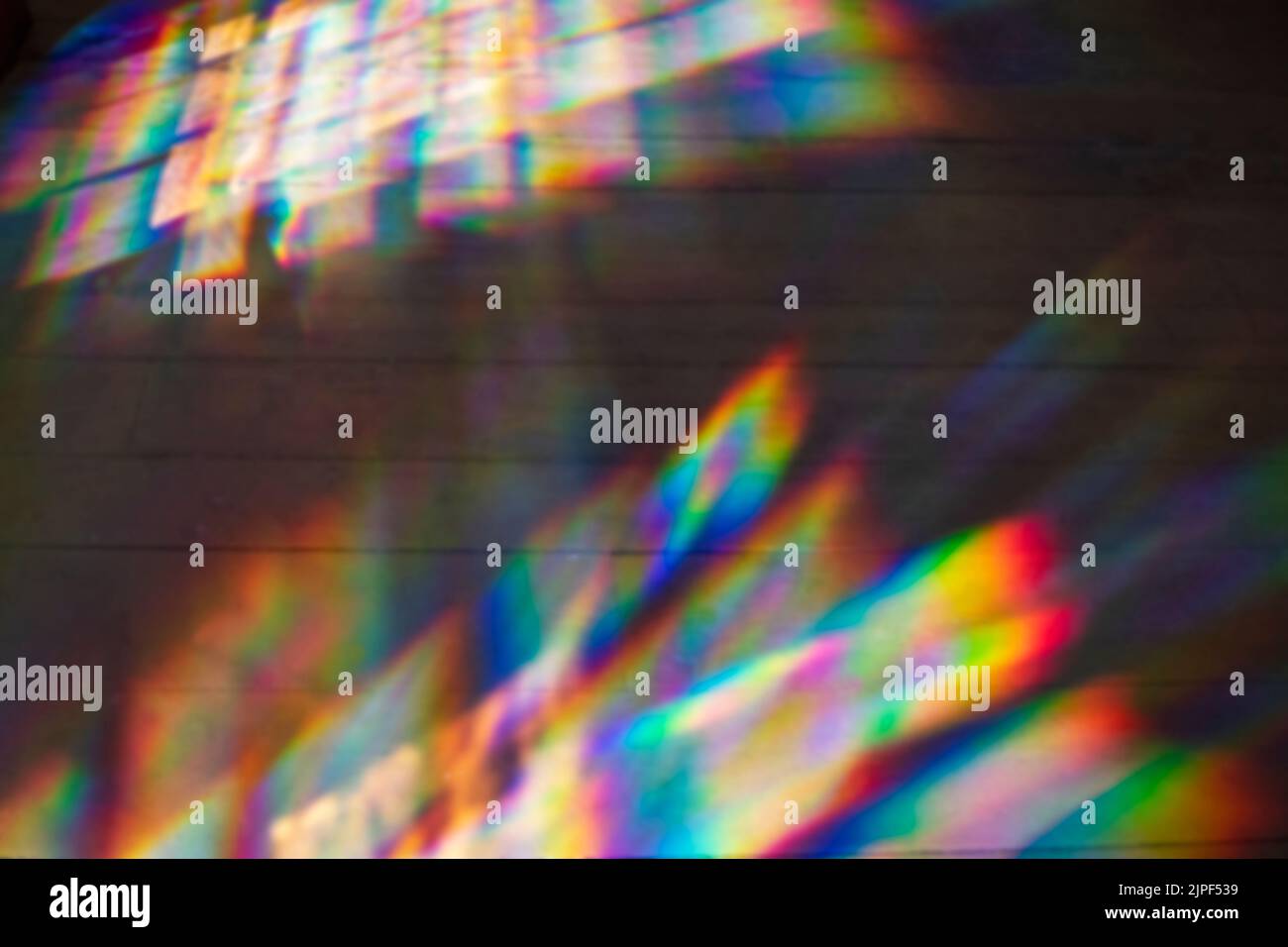 prismatic window light pattern at Hancock Shaker Village interior floor Stock Photo