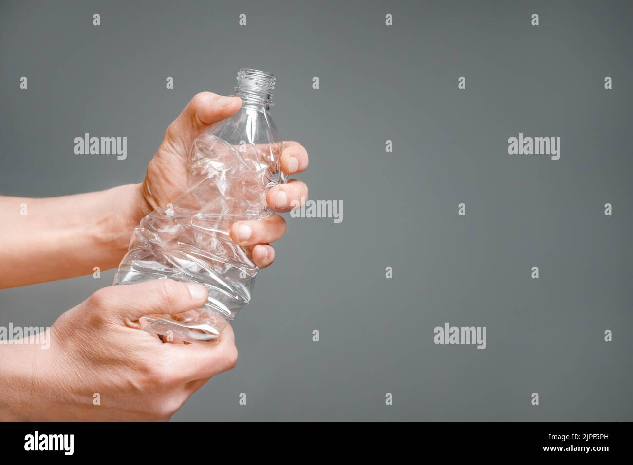 Crumpled bottle pet plastic resize or zero waste plastic hand recycling