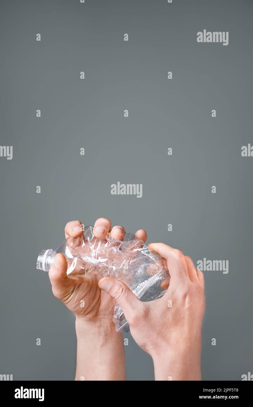 Crumpled bottle pet plastic resize or zero waste plastic hand recycling