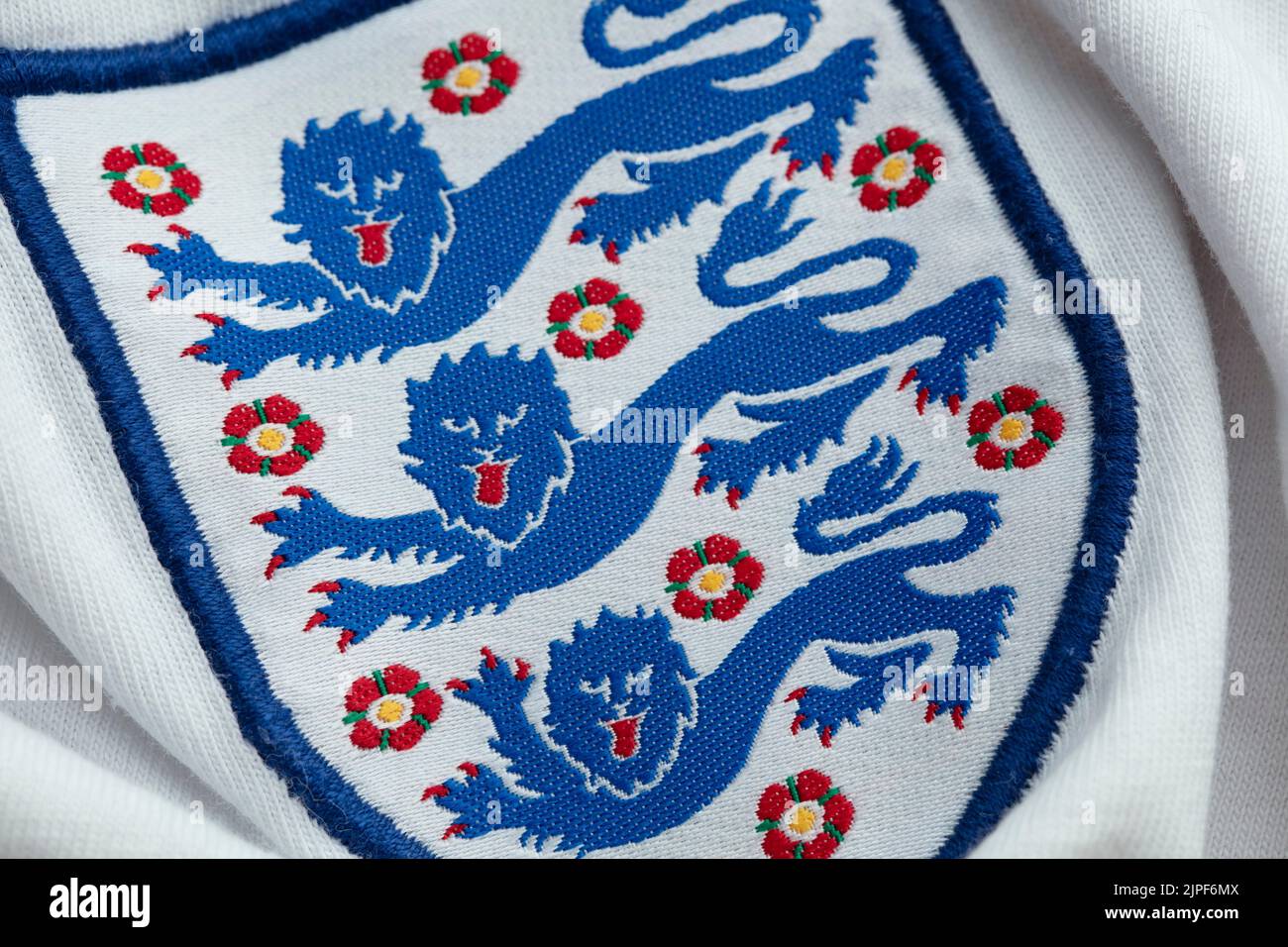 LONDON, UK - August 2022: Three lions national emblem badge on an England football team shirt Stock Photo