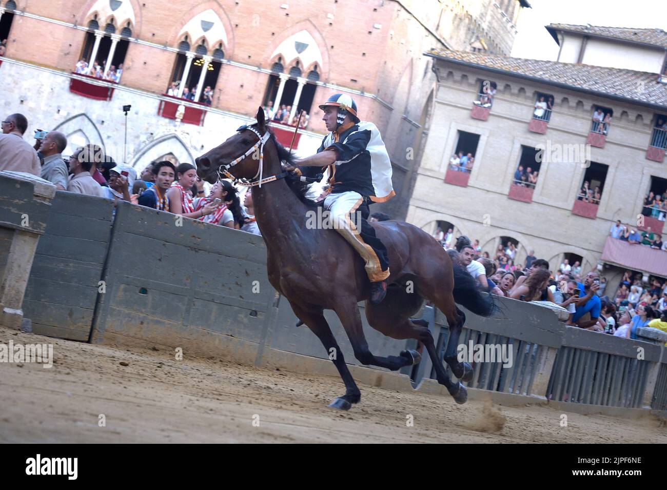 Jockeys compete at the historical horse race Palio di Siena 2022 on ...