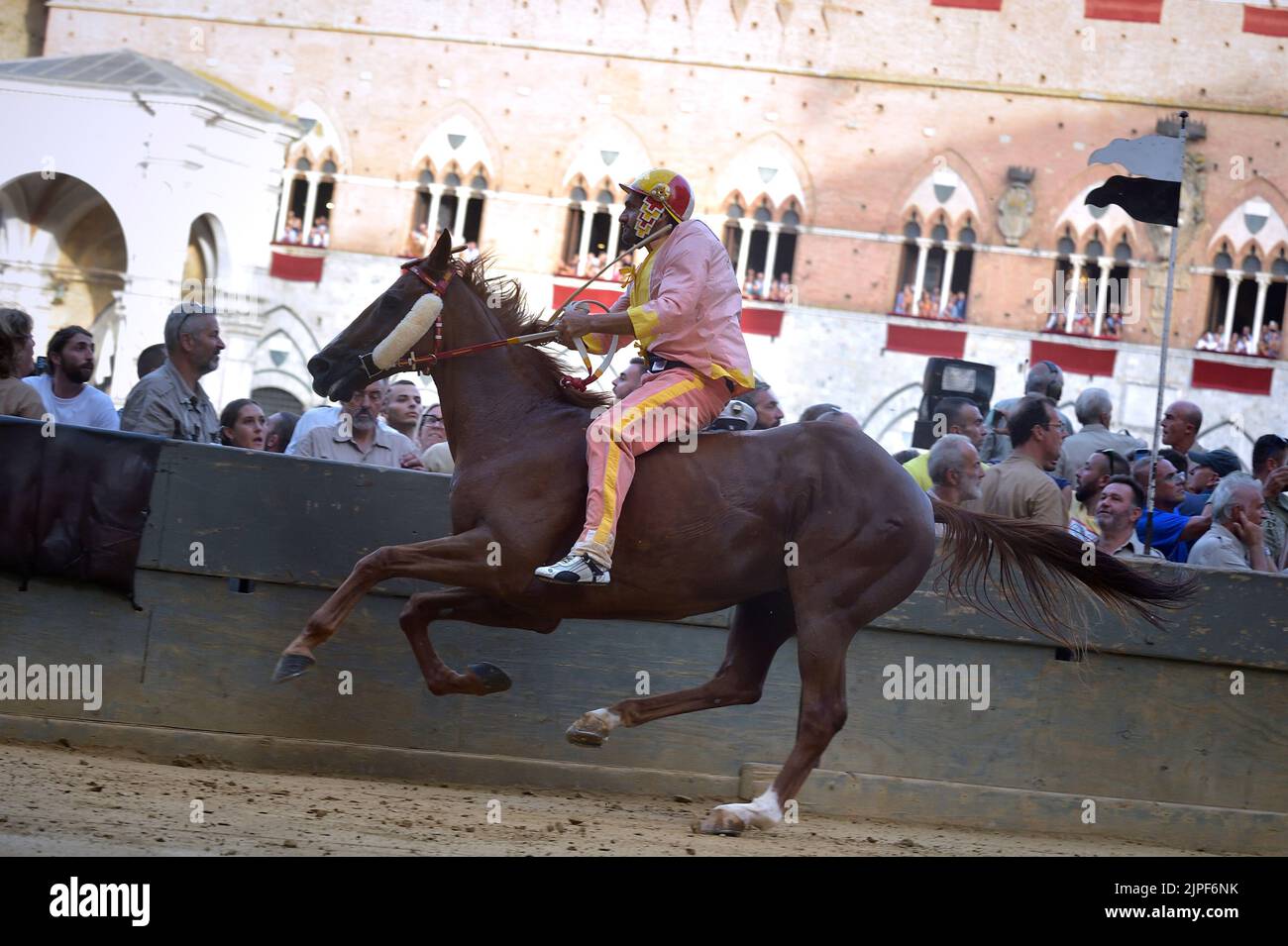 Jockeys compete at the historical horse race Palio di Siena 2022 on ...