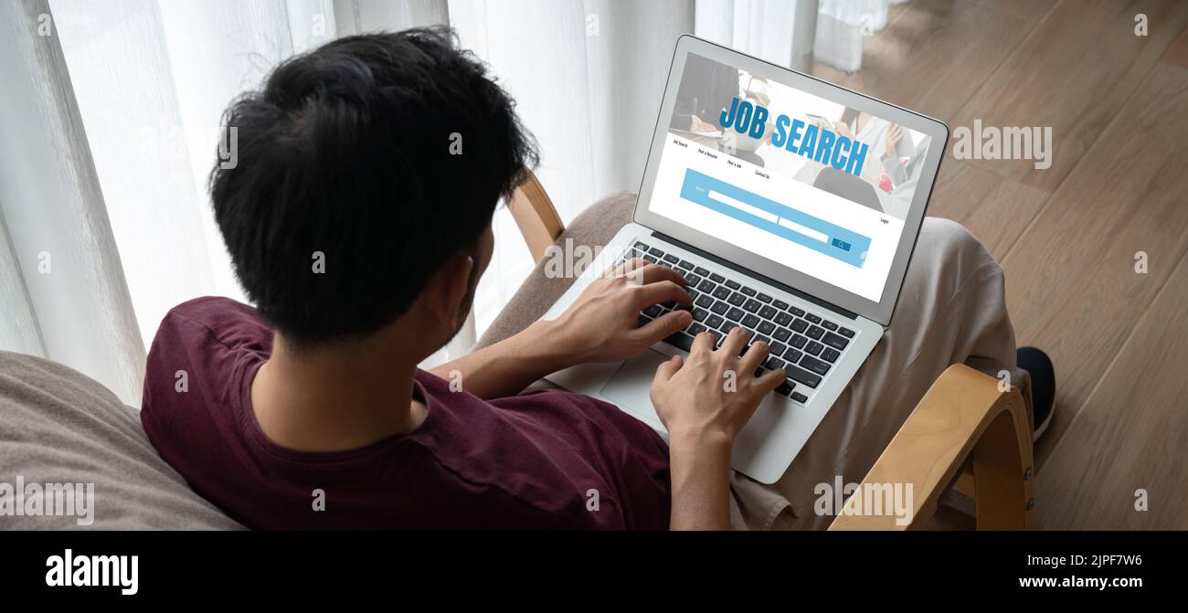 Online job search on modish website for worker to search for job opportunities on the recruitment internet network Stock Photo