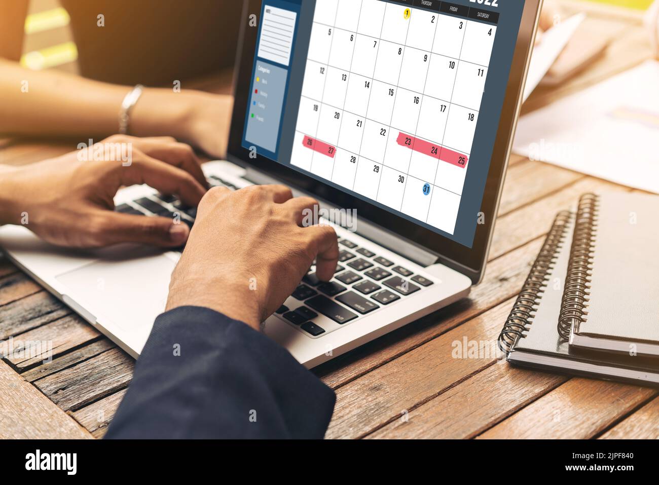 Calendar on computer software application for modish schedule planning for personal organizer and online business Stock Photo