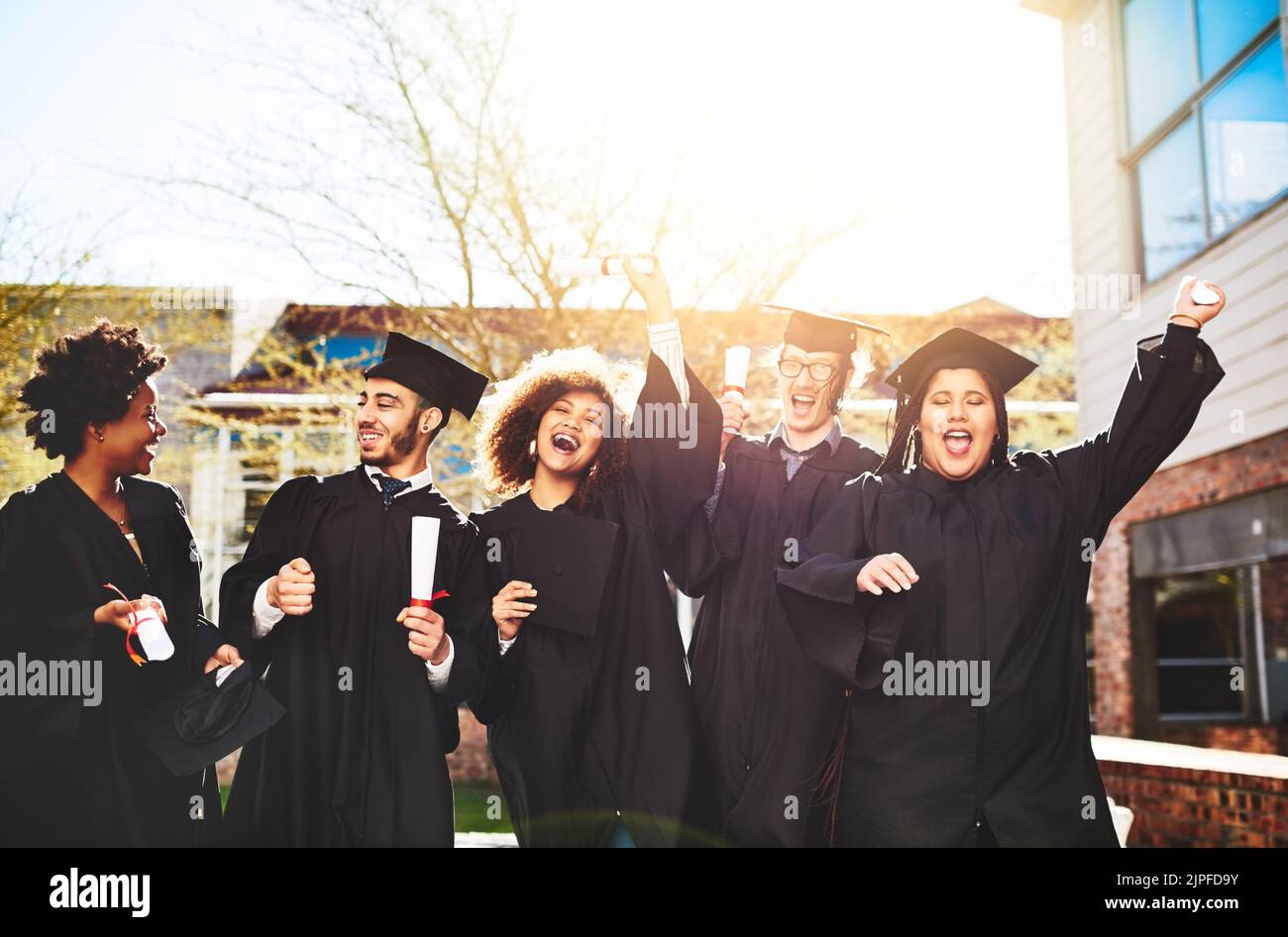 We have reason to celebrate. a group of students standing together on ...