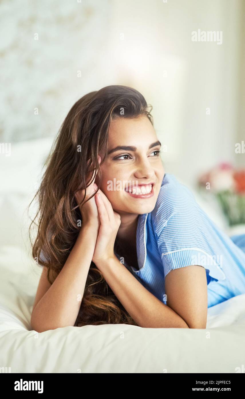 Woman relaxing on bed hi-res stock photography and images - Alamy
