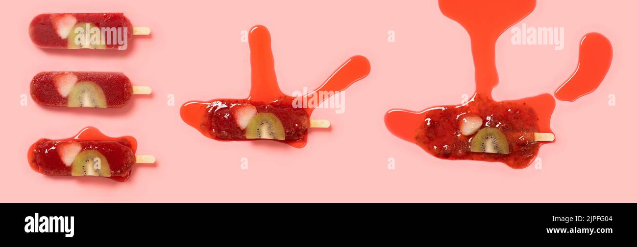 cherry flavor popsicle with slice of kiwi fruit and strawberry melting process on a pink background at top angle view Stock Photo