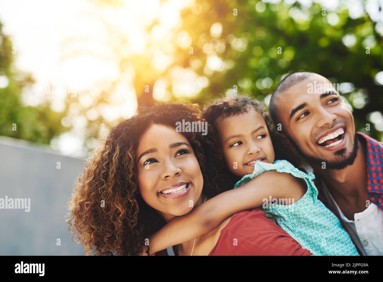 Family love, the truest love. a happy little girl and her parents
