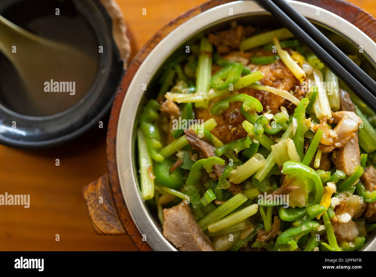 top view fast food of fried pork and fish with celery with bowl of soup horizontal composition Stock Photo