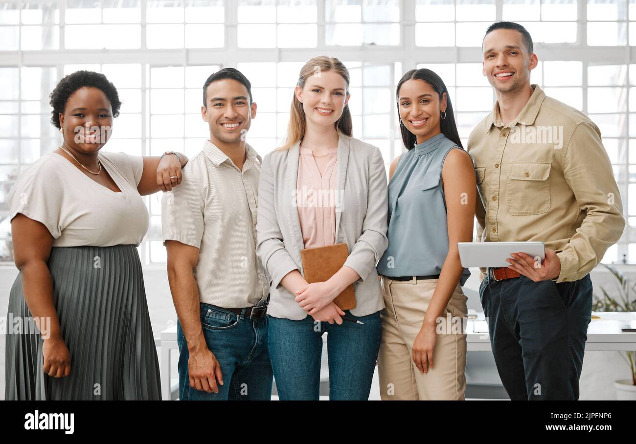 Happy, smiling and diverse team of business people standing in unity ...