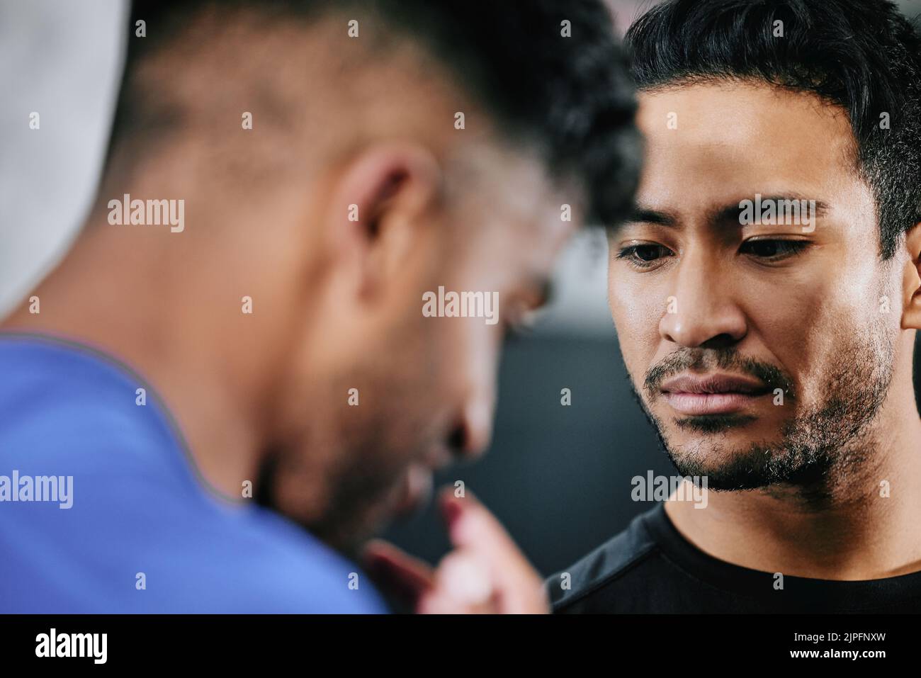 Angry, aggressive and fight with a young man fighting, showing