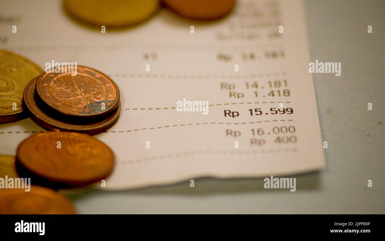 Close up payment receipt calculation with Indonesia rupiah Stock Photo