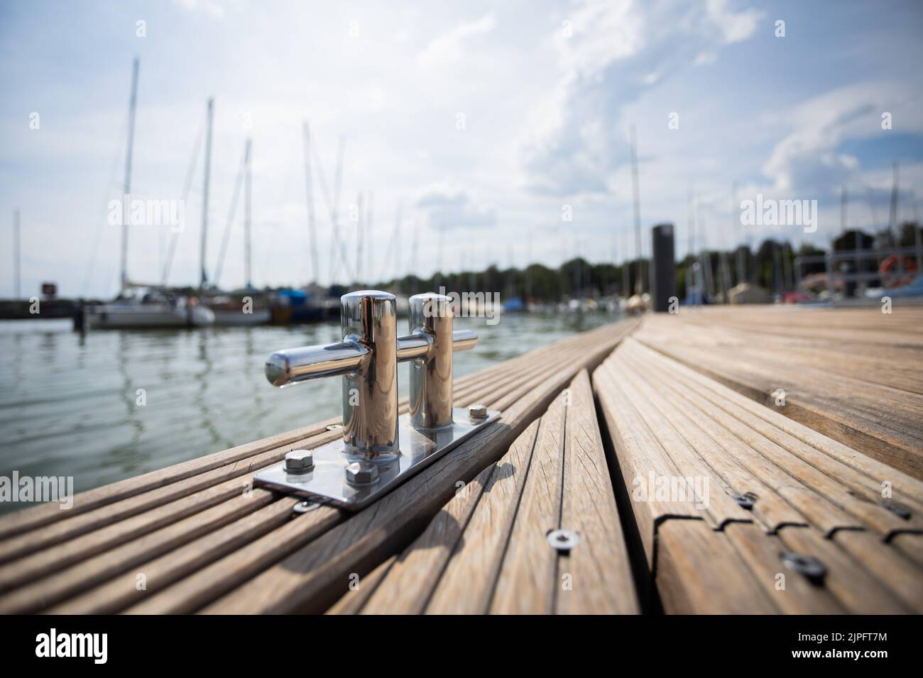 Berlin, Germany. 17th Aug, 2022. The barrier-free floating jetty platform of the association 'Seglerhaus am Wannsee', which enables sailors to board the boat more easily. After the Special Olympics World Games 2023 in Berlin, the platform, which cost 200,000 euros, is to be dismantled for just as much money because, in the view of the district authorities, it casts shadows on the water and impairs fish. Credit: Christoph Soeder/dpa/Alamy Live News Stock Photo
