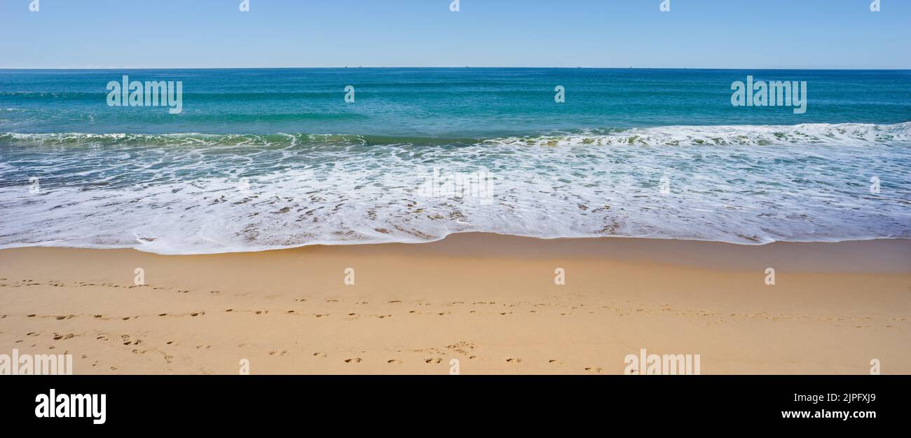 A peaceful scene at the beach on a calm, winter day in Buddina, South East Queensland. Stock Photo