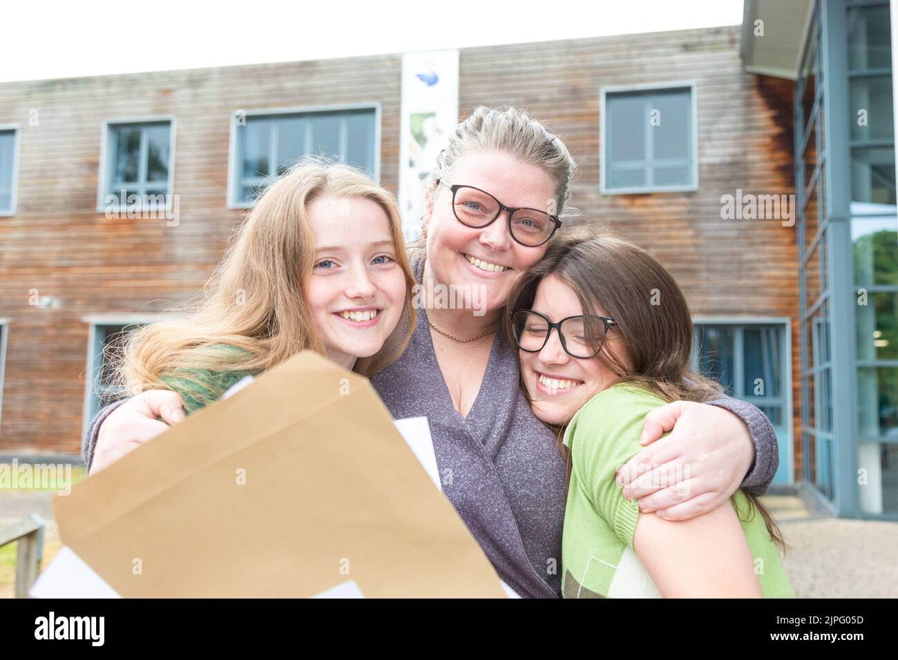 Bewdley, Worcestershire, UK. 18th Aug, 2022. Star and Storm Powell with a very proud mum as they receive their A Level results of The Bewdley School, Worcestershire. Credit: Peter Lopeman/Alamy Live News Stock Photo