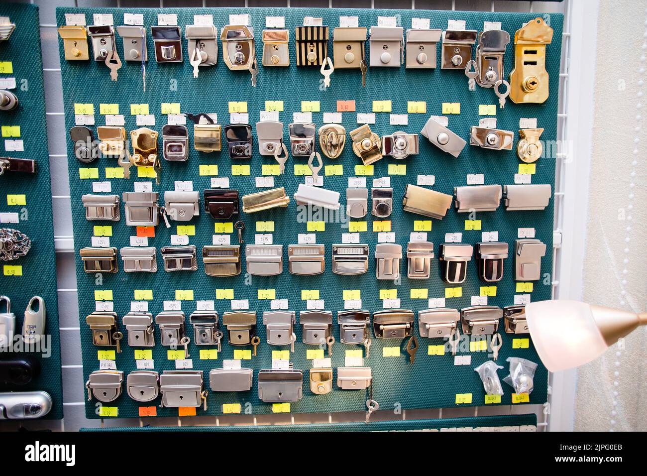 Metal snap hooks clasp for bags of different types on showcase. Lock