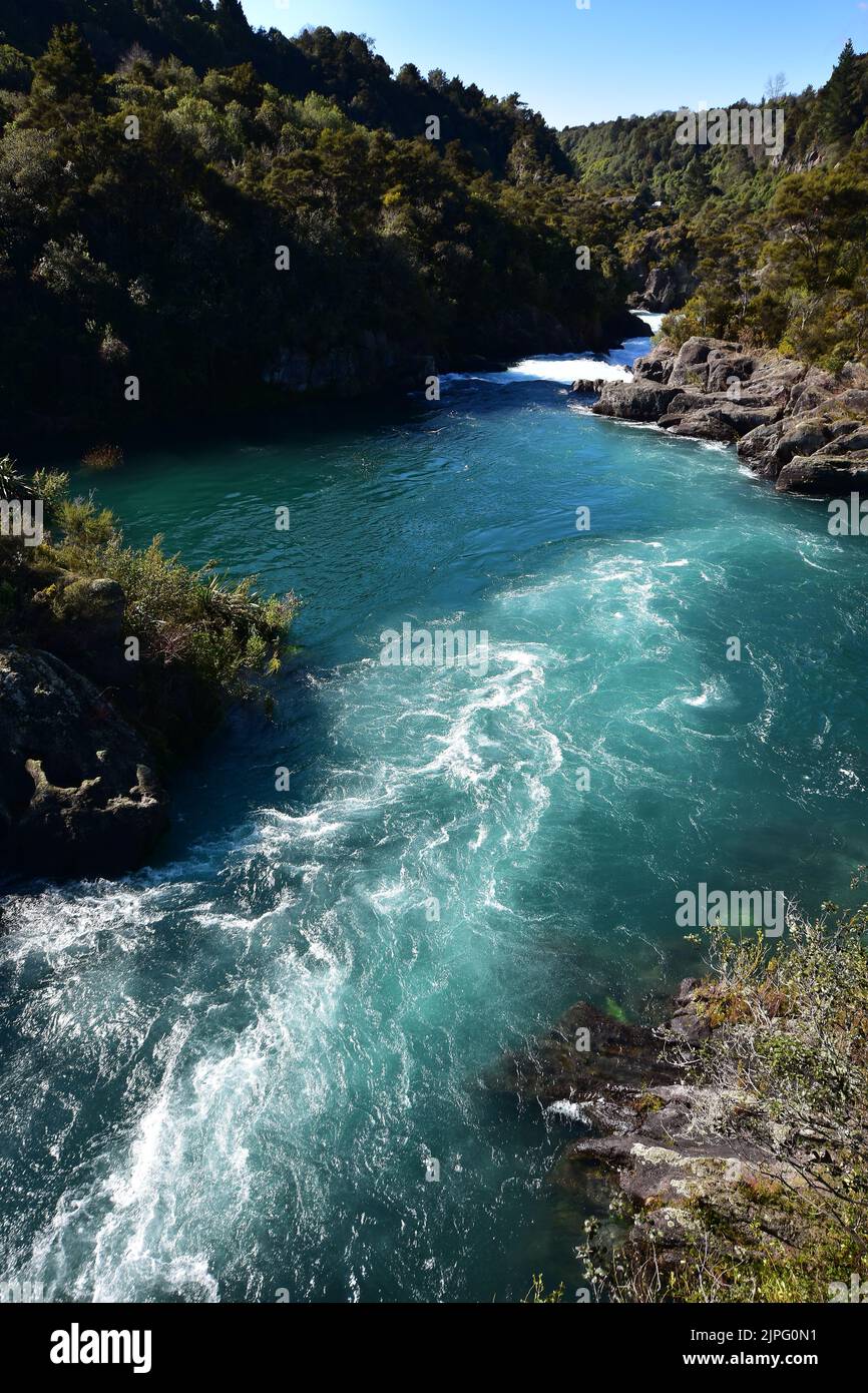 Fast flowing waters of Waikato River at Aratiatia Rapids. Location: Taupo New Zealand Stock Photo