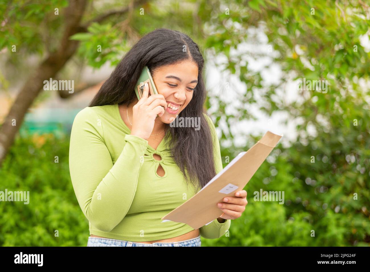 Bewdley, Worcestershire, UK. 18th Aug, 2022. Latisha Cope of Bewdley Sixth Form, Worcestershire, tells her parents the good news of her A Level exam results. Credit: Peter Lopeman/Alamy Live News Stock Photo