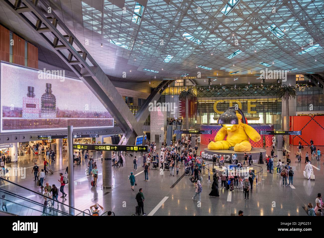 Hamad Terminal Interior of Hamad International Airport Terminal full of Tourist People ...