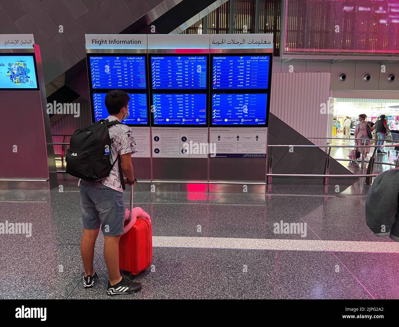 Hamad International Airport Doha Qatar. Flight Information Board Stock Photo