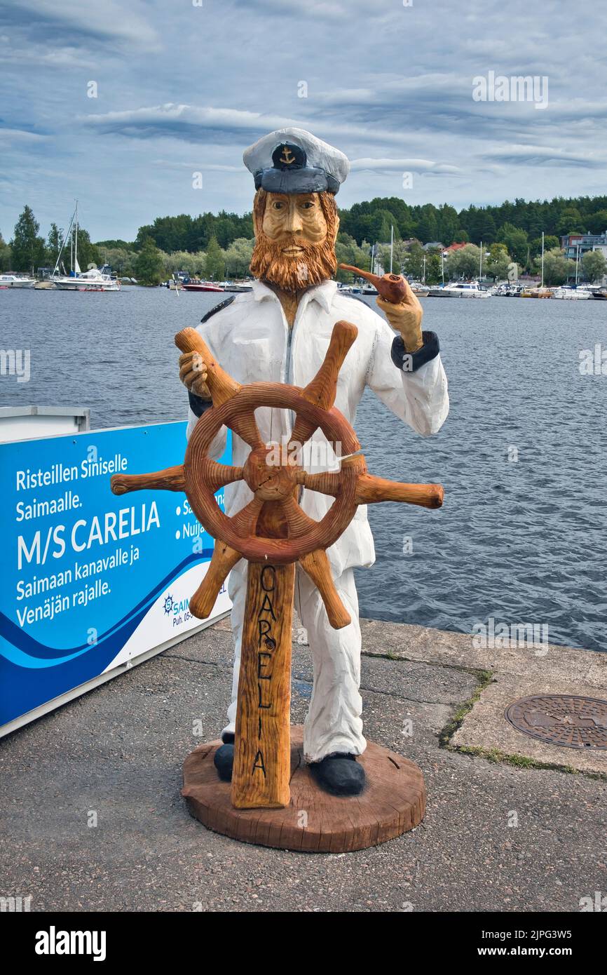 wooden ship captain statue in harbour, Lappeenranta Finland Stock Photo