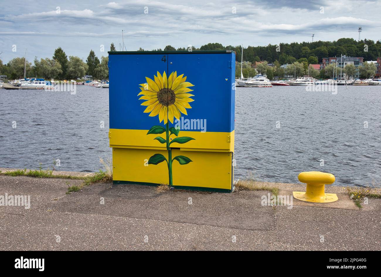 ukrainian colours and sunflower painted outdoors, Lappeenranta Finland Stock Photo