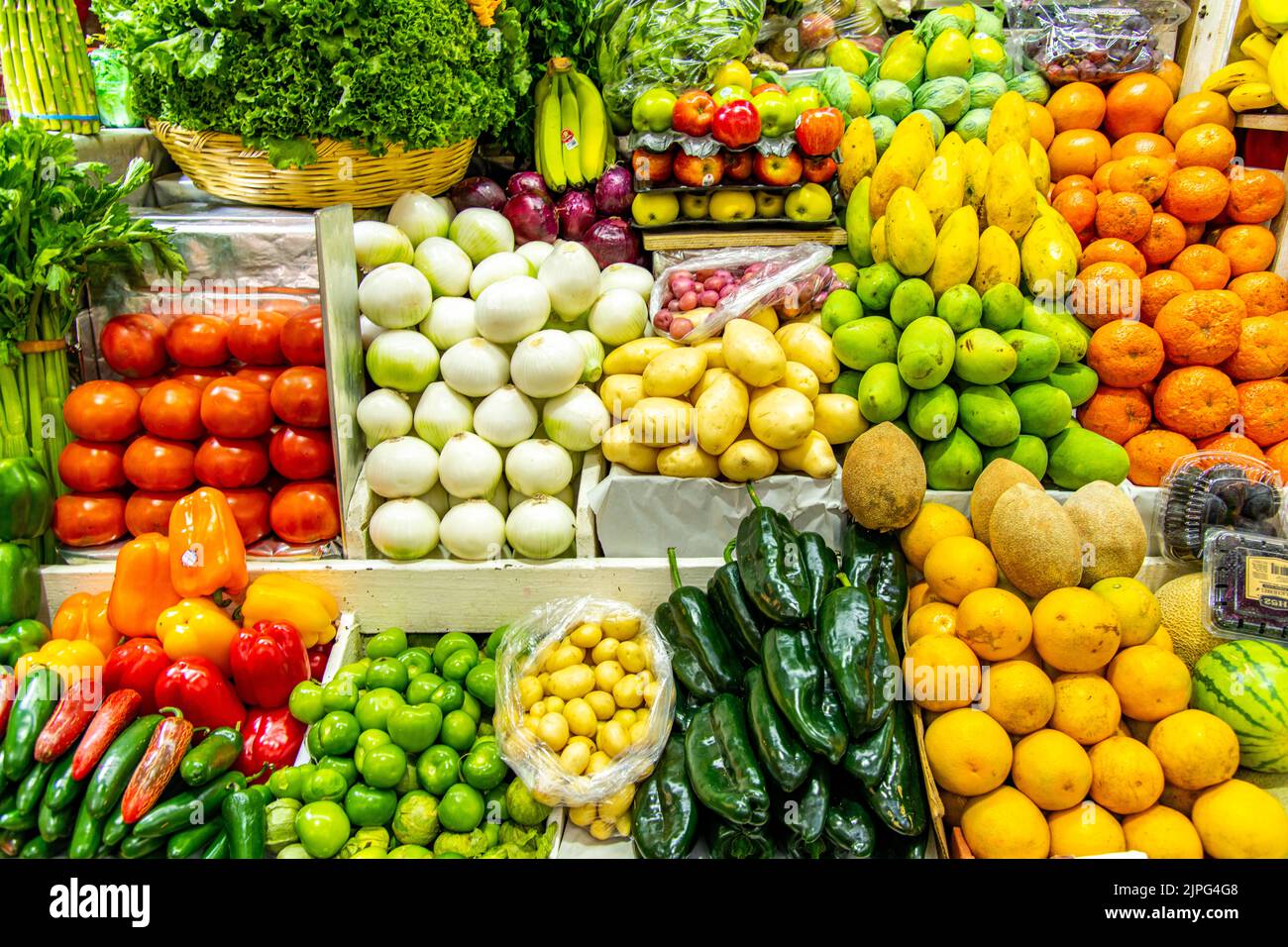 Various fruits and vegetables being sold at Coyoacan Market in Mexico City, Mexico Stock Photo