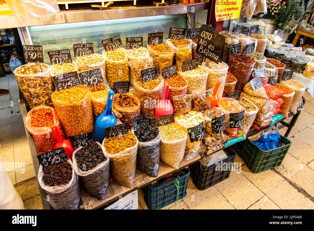 Various nuts, dried fruits and legumes being sold at Coyoacan Market in Mexico City, Mexico Stock Photo
