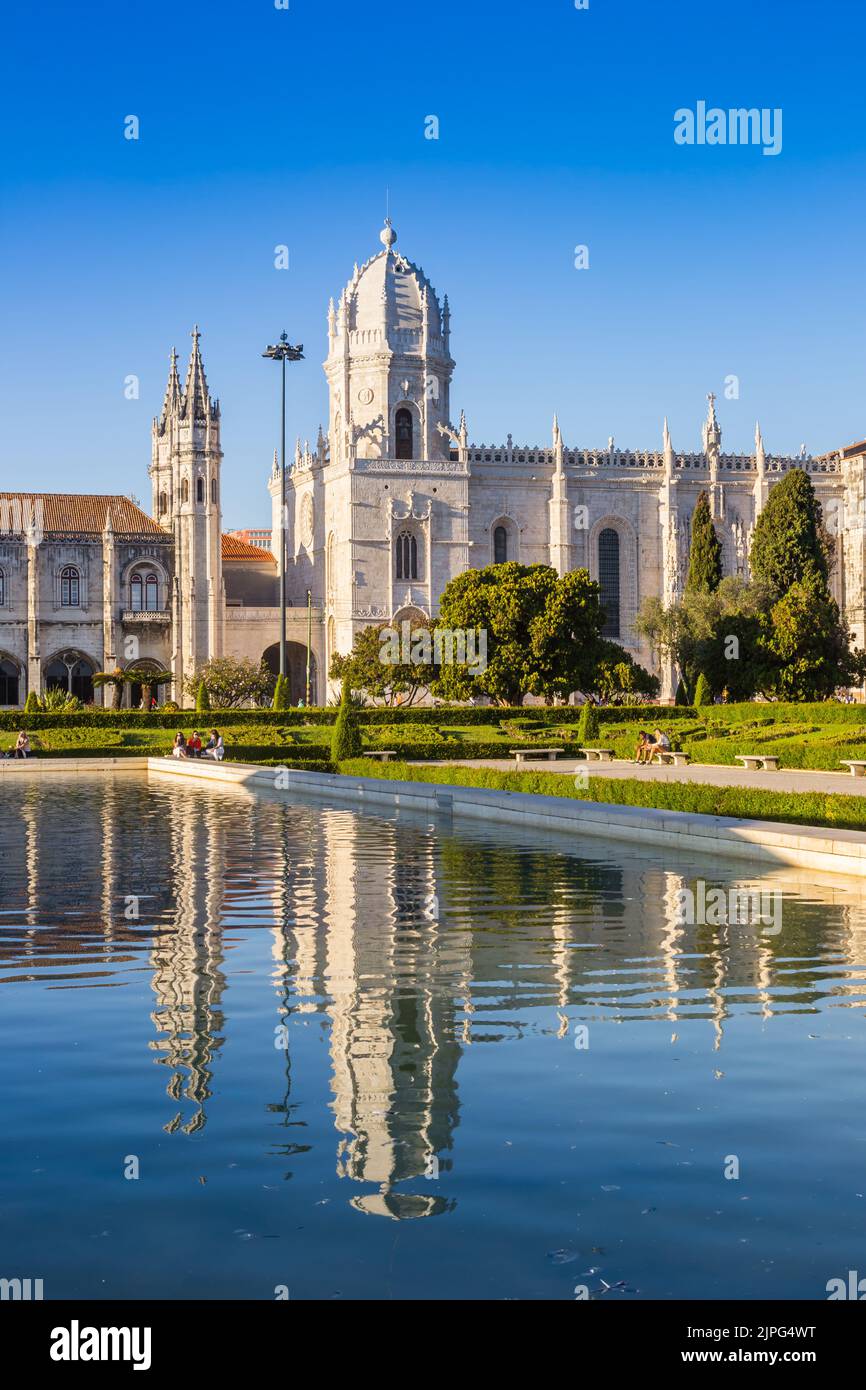 Towers of the Jeronimos monastery with reflection in the pond in Belem, Lisbon, Portugal Stock Photo