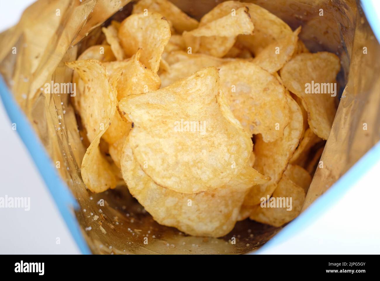 gourmet potato crisps in packet Stock Photo