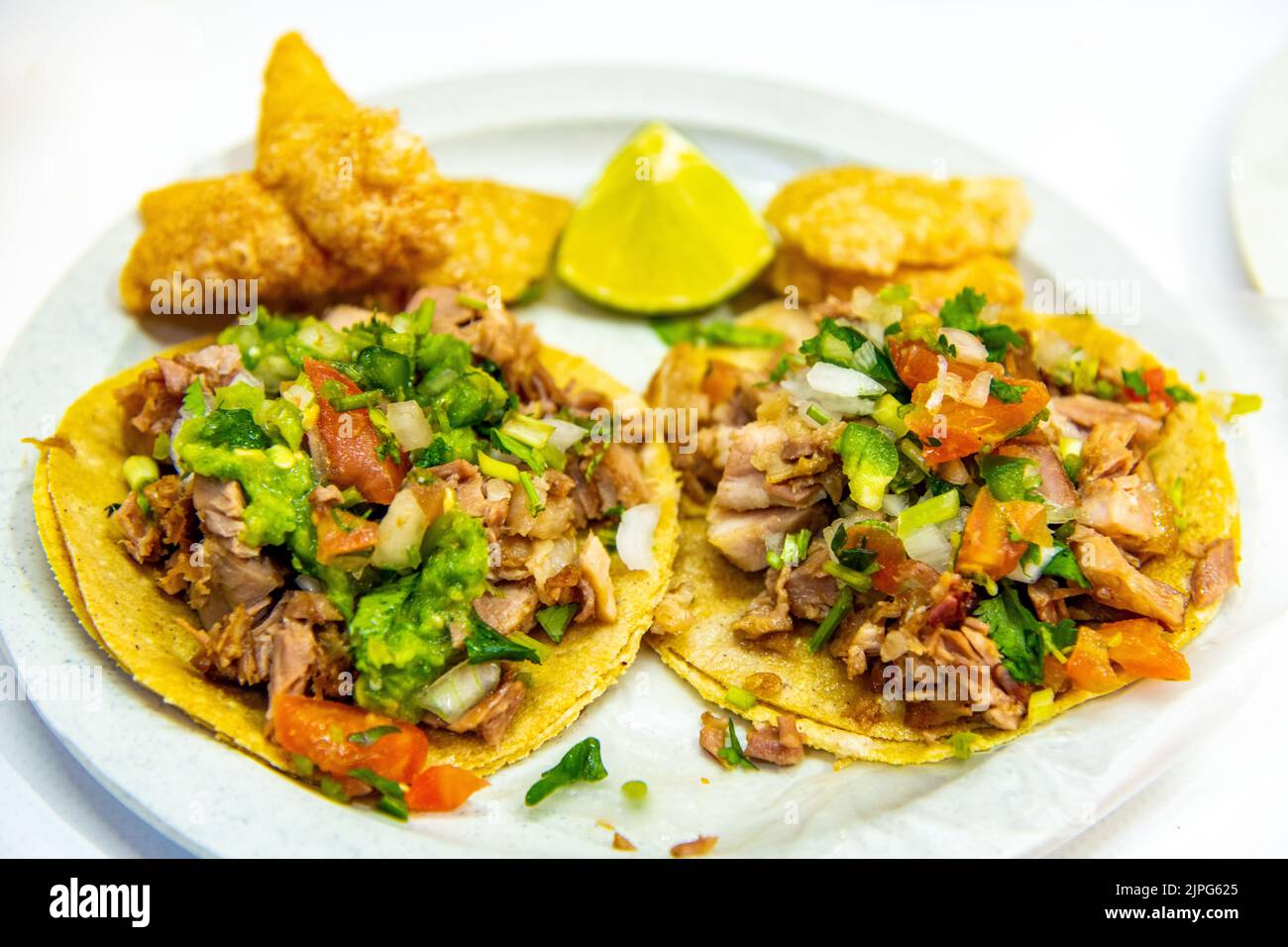 A pair of pork tacos at Coyoacan Market in Mexico City, Mexico Stock Photo