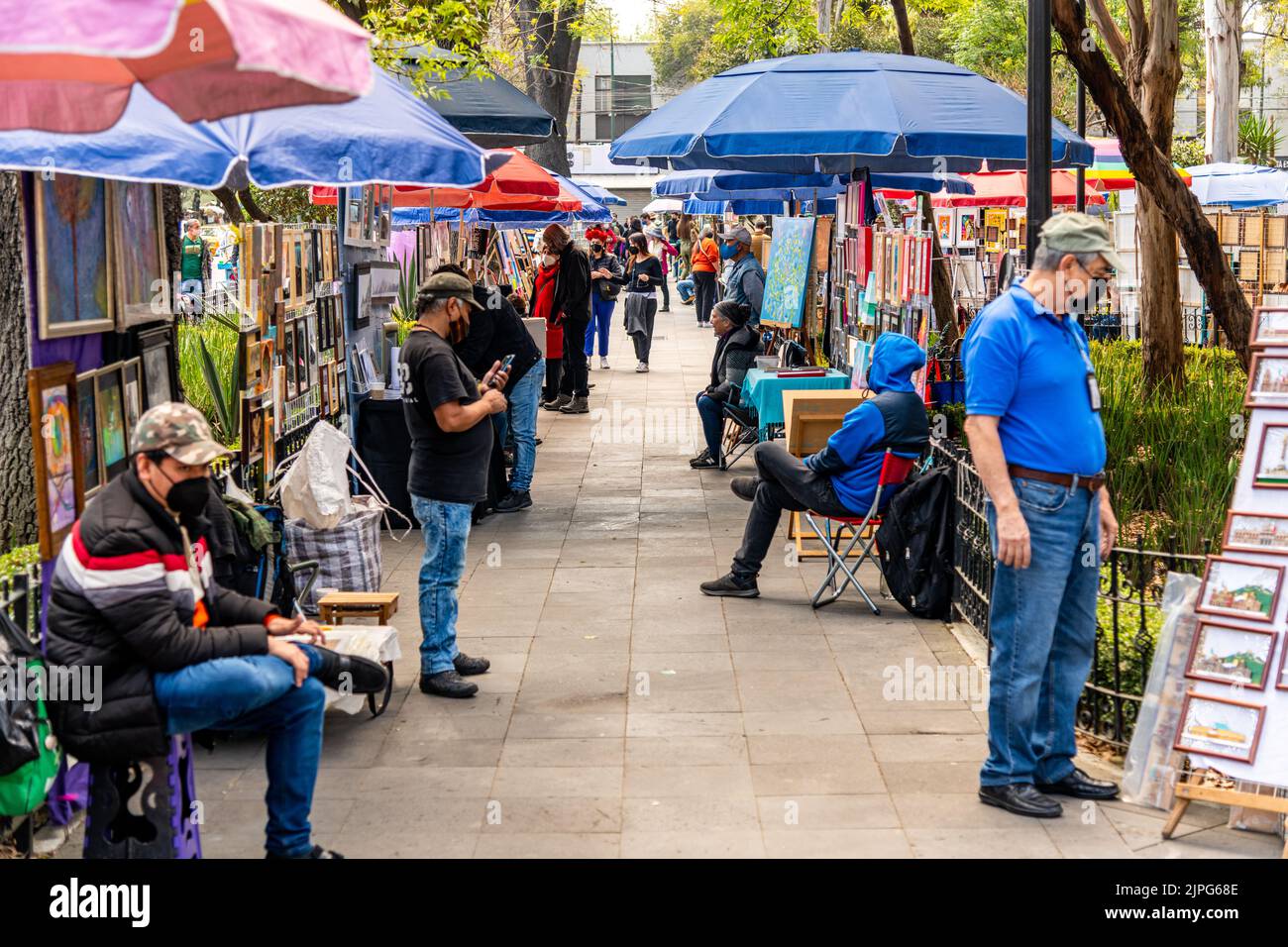 Artists and painters displaying their artwork in a park in Mexico City, Mexico Stock Photo