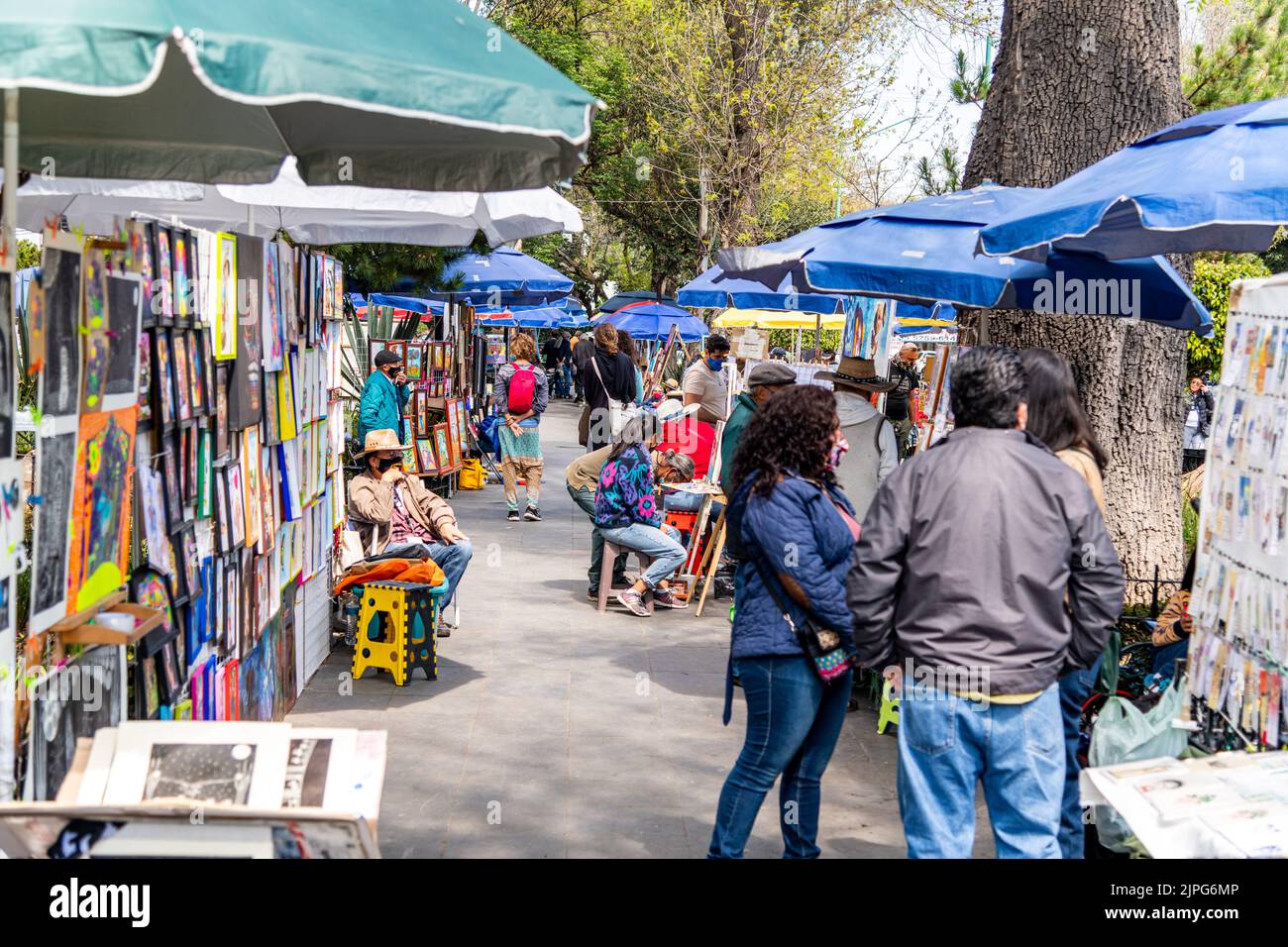 Painters and artists selling their artwork in a park in Coyoacan ...